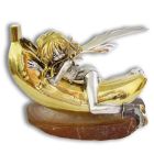 Серебряная статуэтка «Девушка на банане»